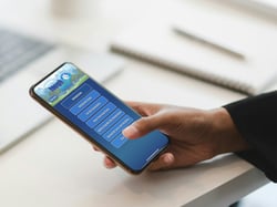 A person scrolling on a cel phone