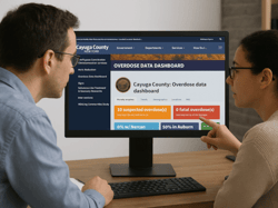 two colleagues looking at a computer which shows this webpage: https://www.cayugacounty.us/1634/Overdose-Data-Dashboard two colleagues looking at a computer which shows this webpage: https://www.cayugacounty.us/1634/Overdose-Data-Dashboard